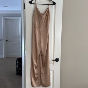Gold jumpsuit new with tags, Size Small